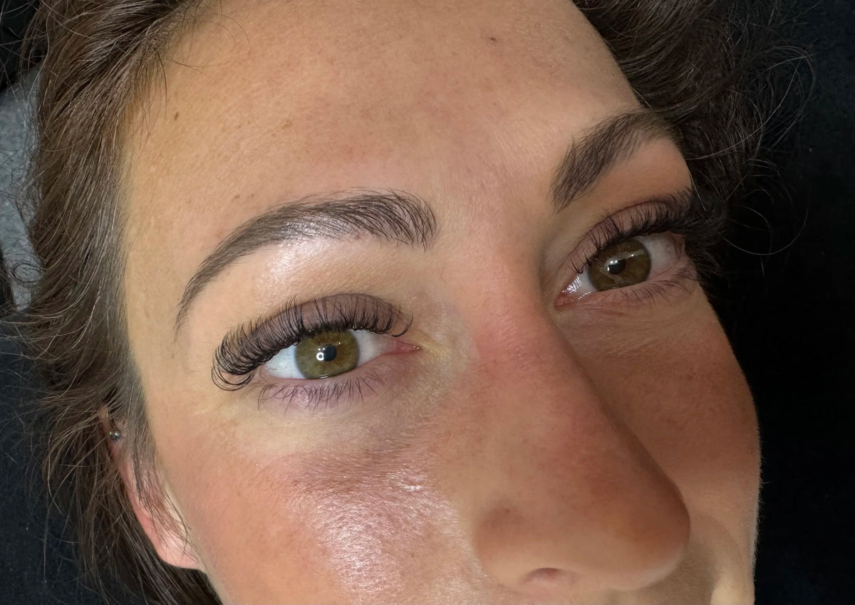 Close-up of a guest's eye with eyelash extensions at Oh Baby Salon and Spa in Bloomington, Illinois