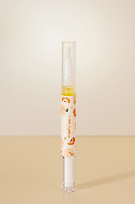 The Nail Junkie Cuticle Oil Pen- Peach